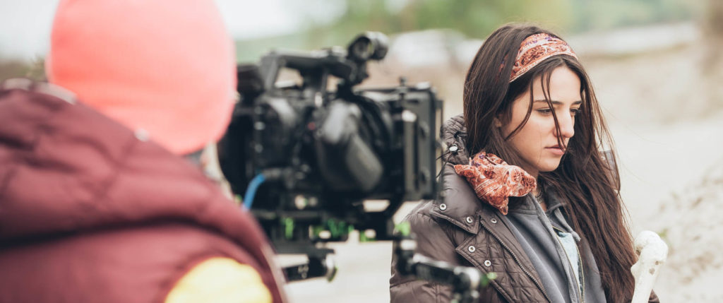 An actress staring out of shot demonstrating the outcome of learning how to improve as an actor